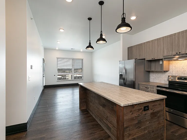 Welcome to Quarry Town Apartments, where modern design meets comfort. This stylish kitchen boasts sleek finishes, ample space, and natural light that enhances everyday living. Don't miss your chance to make this home yoursschedule a tour today!