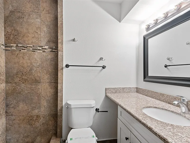 9308 Tooley Dr — Photo 17