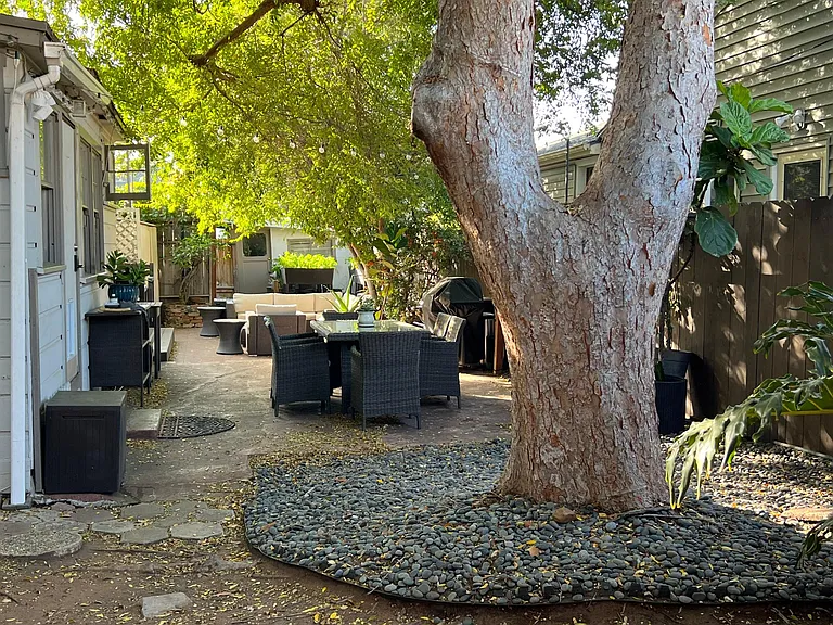 View of back patio from side yard