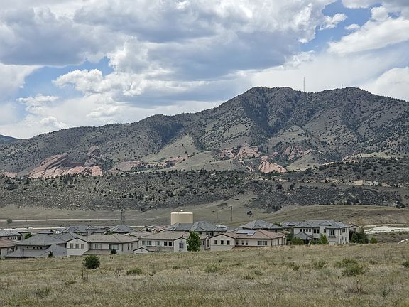 Enjoy sweeping views of Mount Morrison and Red Rocks throughout the neighborhood