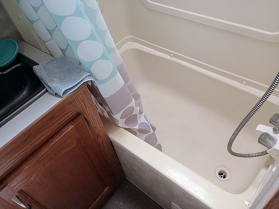 Tub and shower with pressure