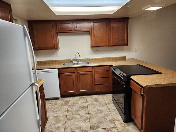 Tile Flooring in the Kitchen, LARGE Pantry, Dining Room, Laundry Room & Both Bathrooms!!