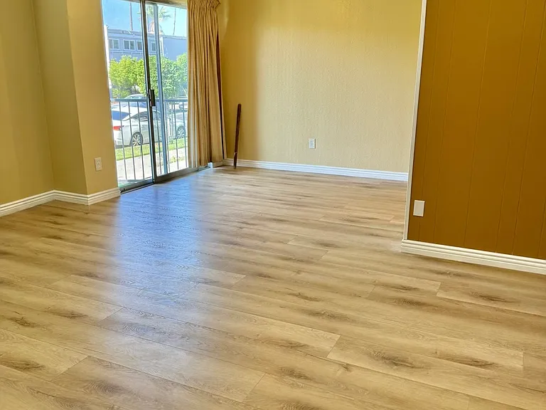 Living Room/Dining Room. 
Sliding door leads to simi private patio.