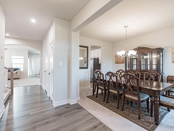 front entrance: formal dining room (right), study room (left)