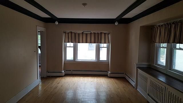 Beautiful woodwork and hardwoods in dining room