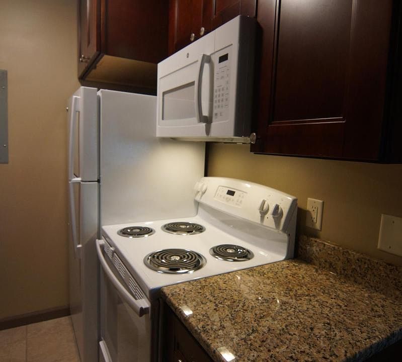 Granite Countertops, Cherry Wood Cabinets,New Appliances