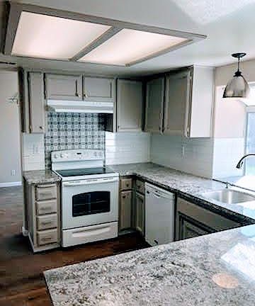 Granite countertops, new appliances, backsplash and fixtures.