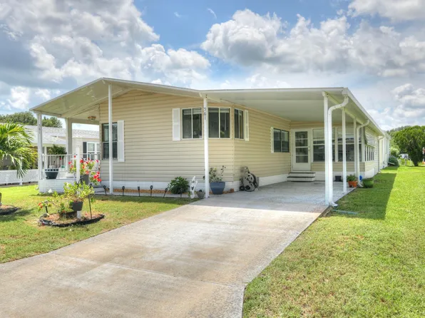 561 Dolphin Circle, Barefoot Bay, FL 32976