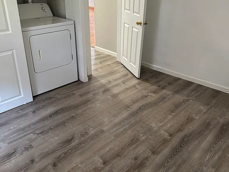 Bedroom #2, new flooring, in unit laundry