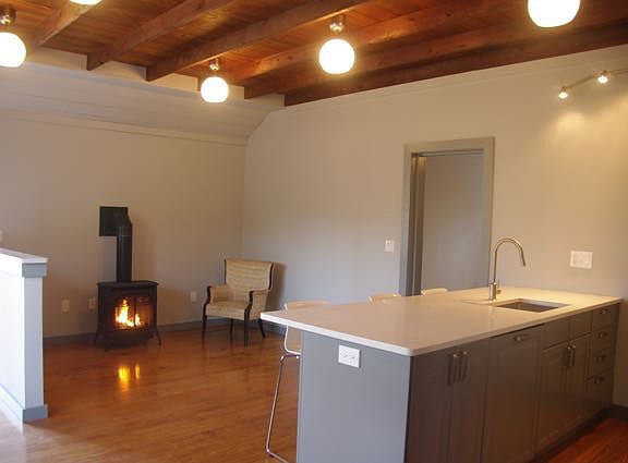 living room with propane fireplace for warmth and ambience