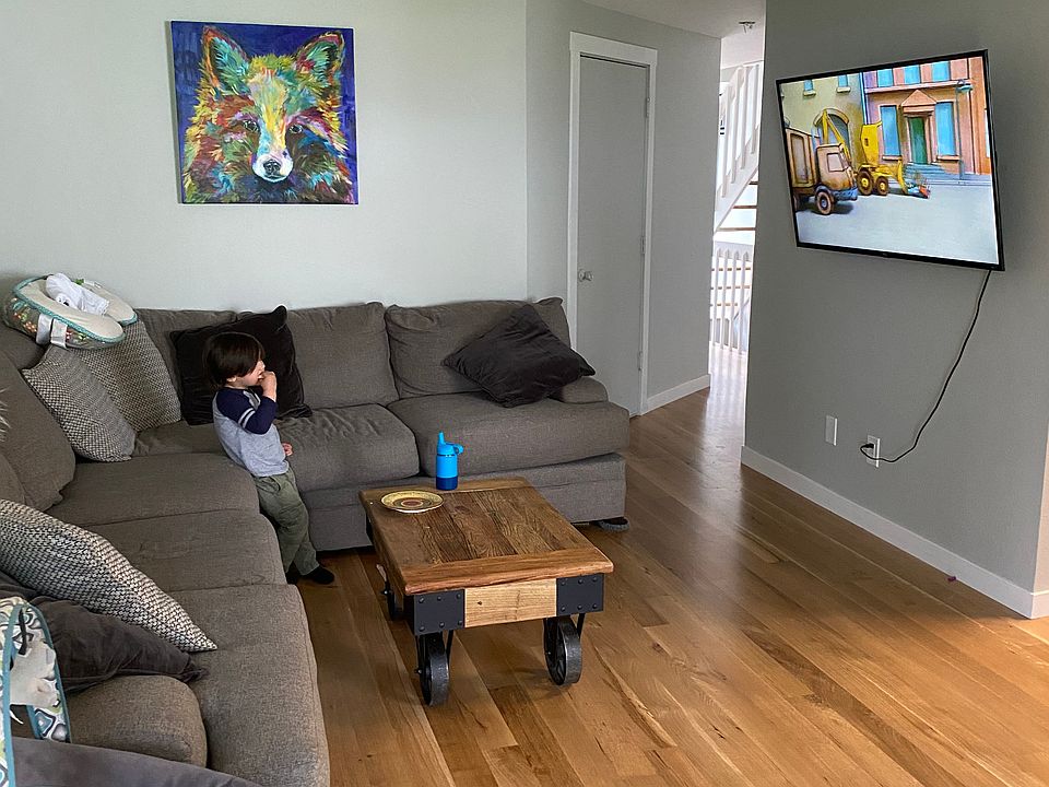 Living room and the kitchen and dining room are off to the right. Kid not included :))