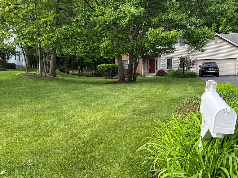 Beautiful view from street; long driveway