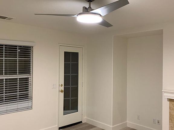 New flooring throughout and new fan in living room!