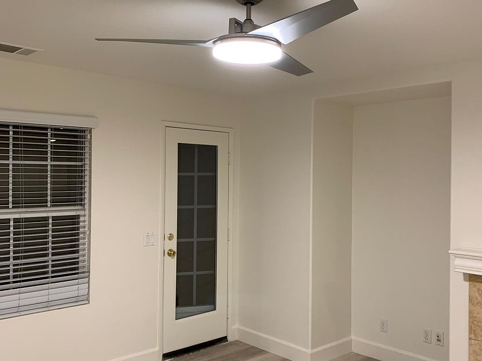 New flooring throughout and new fan in living room!