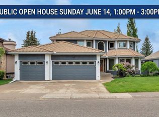 52 E Woodpath Ter SW, Calgary, AB T2W 5Z7