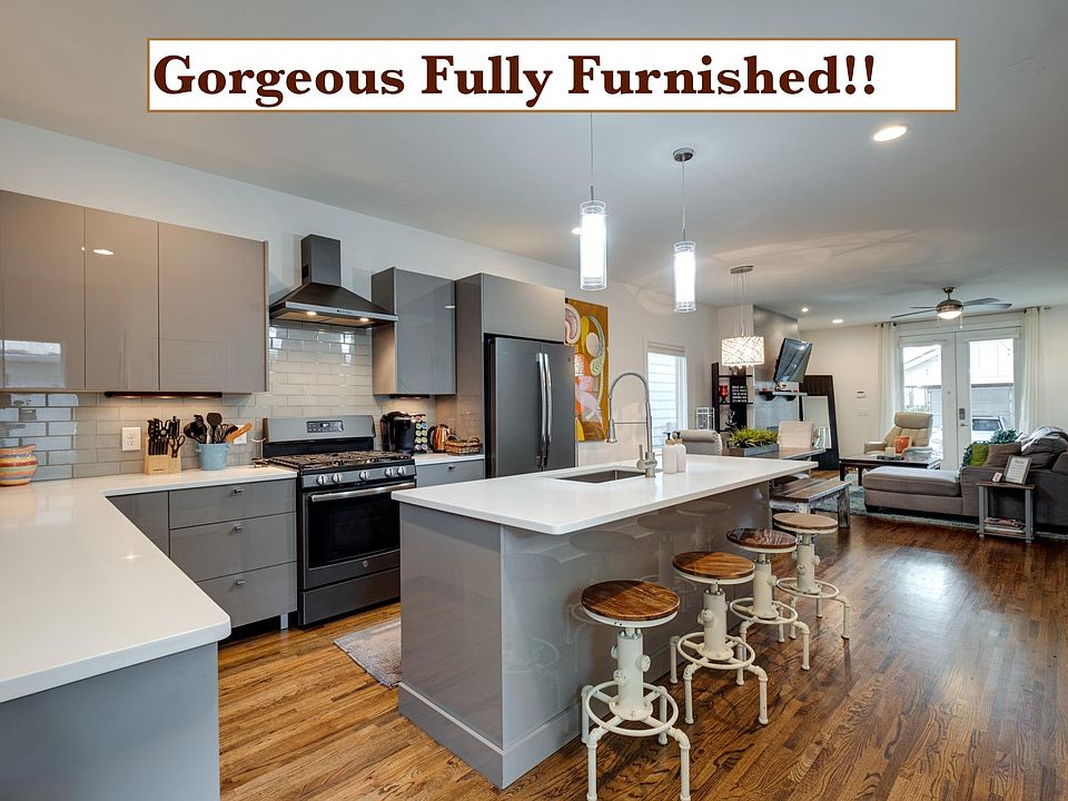Spacious luxury home featuring custom Italian soft-close cabinetry, an open-concept design, and a fully stocked kitchen with everything you'll need to feel right at home.