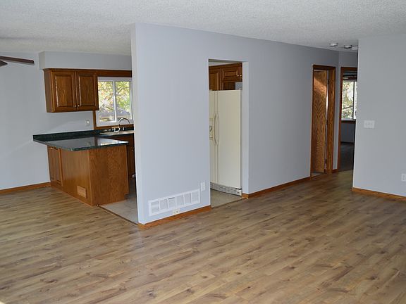 Main level with living room, dining area, kitchen, 2 bedroom