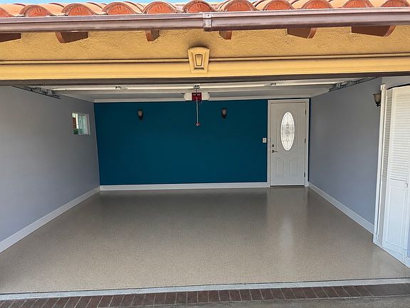Garage with large attic storage that can be used for parking, game room, or gym