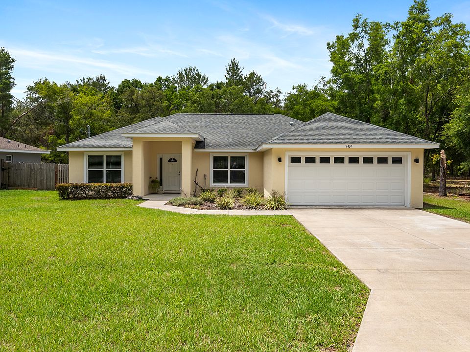 FRONT OF HOUSE 2 VEHICLE GARAGE
