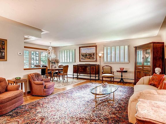 Large living room open to dining room and kitchen.