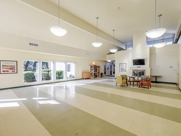 Spacious community lounge, perfect for gatherings, activities, or simply relaxing with neighbors.