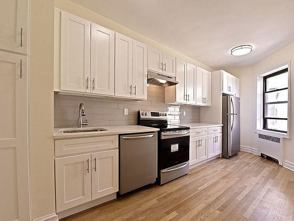 4th image of 8402 35th Ave #6M
