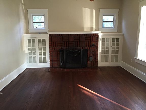 Your family room with wood-burning fireplace and built-in bo