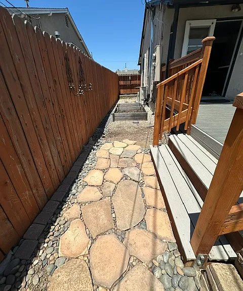 Side yard and raised garden bed