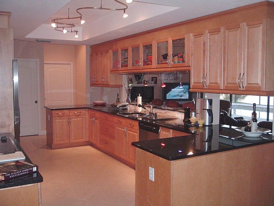 Beautiful Light Cherry Cabinets with Black Opal Granite