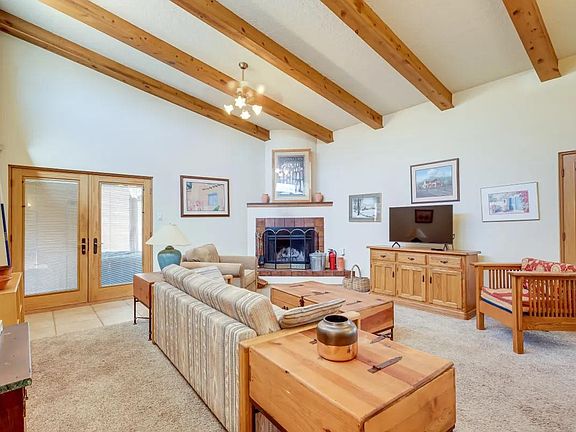 Living room facing fireplace.
