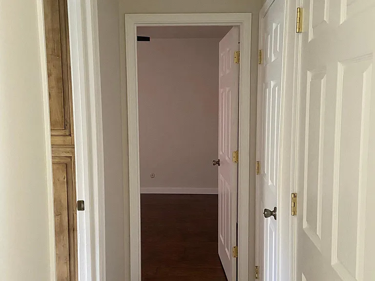 hallway to 2nd bathroom and back bedroom