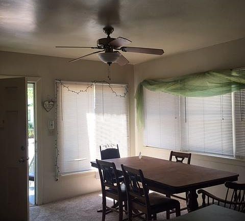 Dining room or living room. Very bright and sunny.