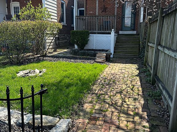 tiny fenced-in back yard