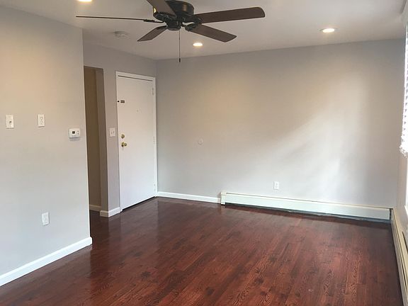 Living room/Hardwood floors throughout the Unit