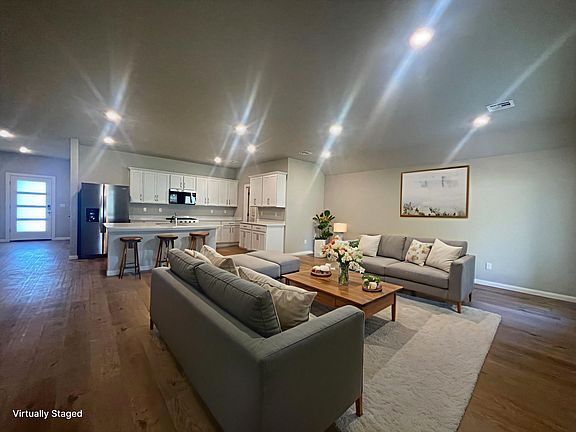 Open Living Room Kitchen Dining Combo, designated Dining off to the side