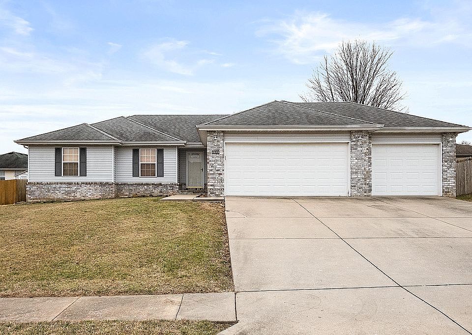 Front with 3 car garage