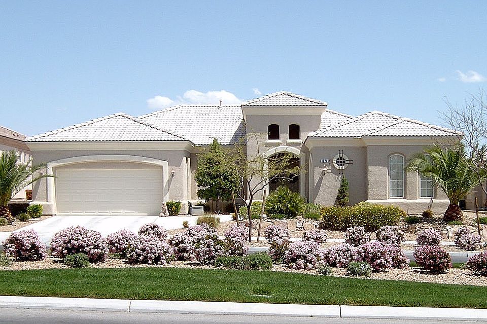 Front, 2 car garage plus oversized golf cart garage