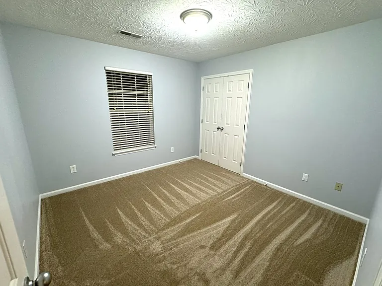 2nd bedroom - French door walk-in closet