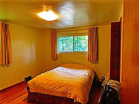 Bedrooms have High Newer Windows, Hardwood in Great Shape and Nice Size Closets.