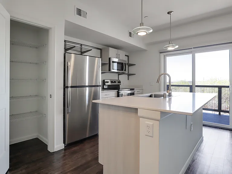312 Pictured, 314 (top floor) has flipped/mirror floorplan, same fixtures & finishes