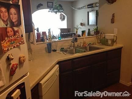 Kitchen Sink
						:
						A pass through to the dining room in front of the kitchen sink