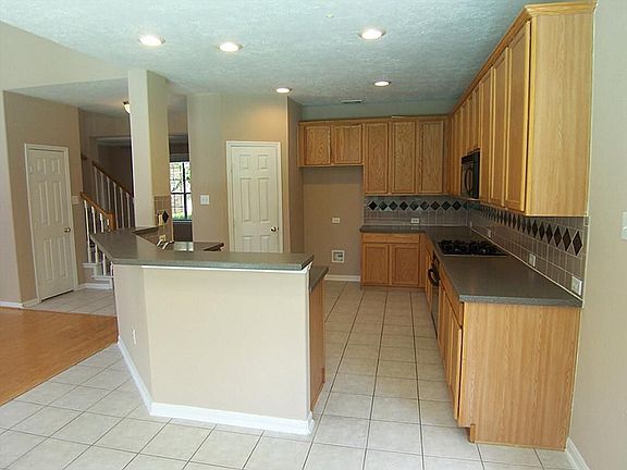 Kitchen is open to family room.