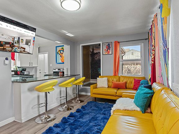 Create cherished memories in our living room, complete with comfy couches