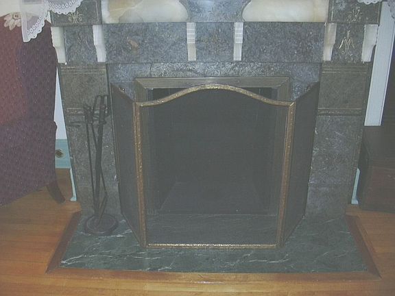 Granite, Quartz & Marble Fireplace in Parlor