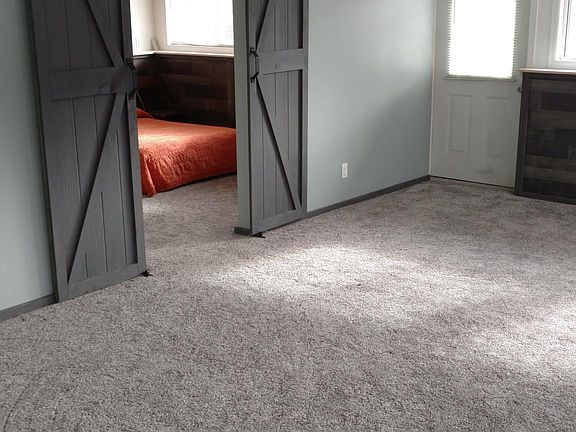 Living room and door to second bedroom
