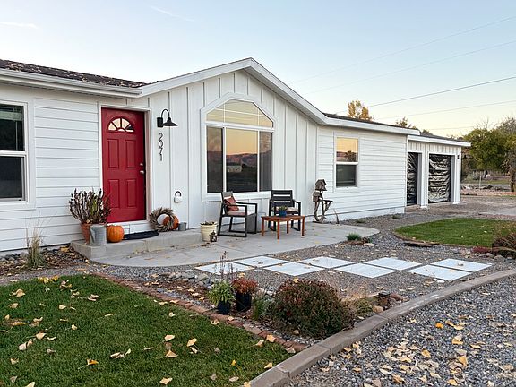 Home sits on 1 acre with circular drive and OS attached garage.