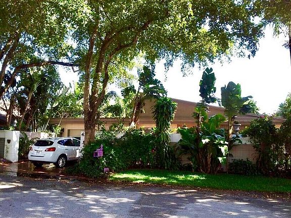 Lush Tropical Landscape surrounds this Private single family home.