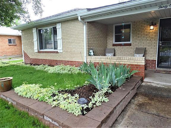 Raised garden bed relaxing porch.