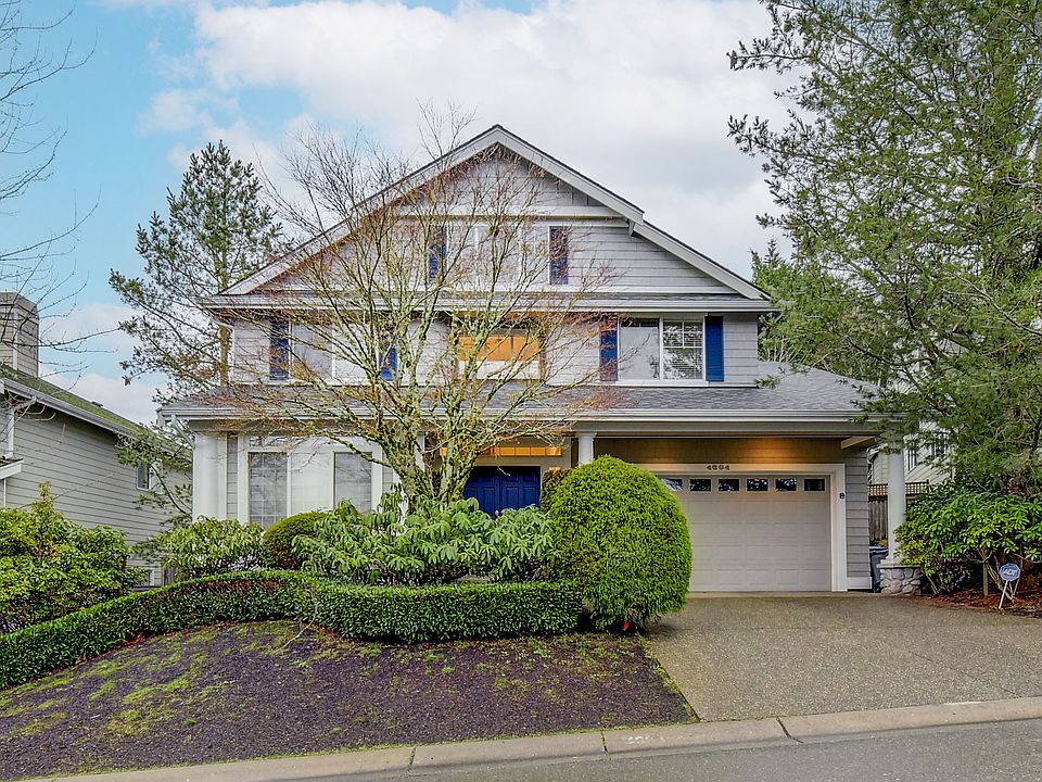 Lucious landscaping in this beautiful 2 story house.