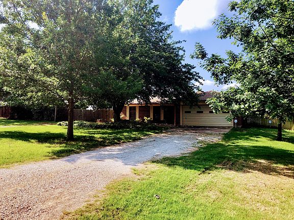 Driveway leading to the garage.